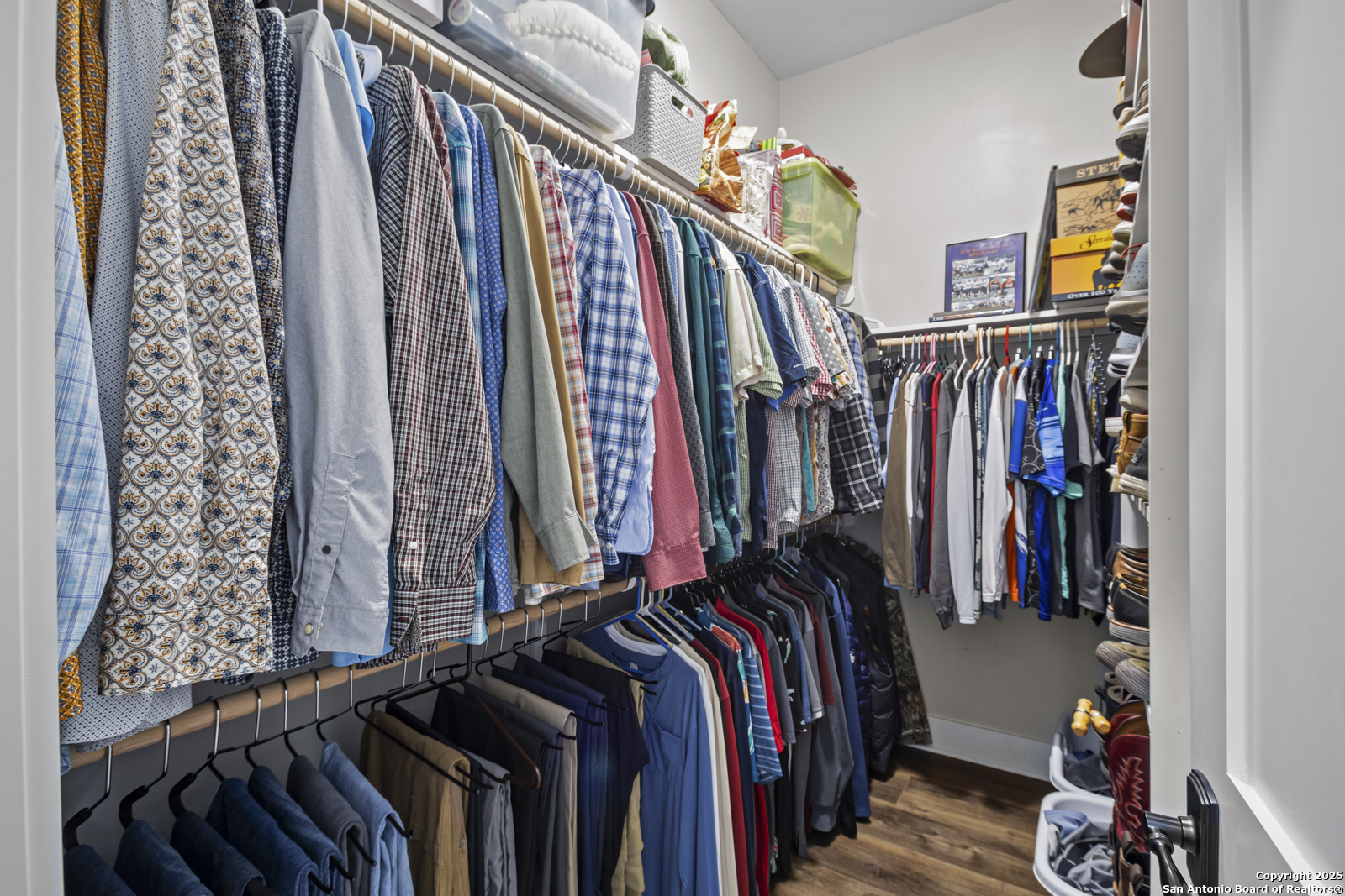 209 River Ridge Boerne, TX 78006 - Photo 25 of 60 a view of walk in closet with clothes and shoes