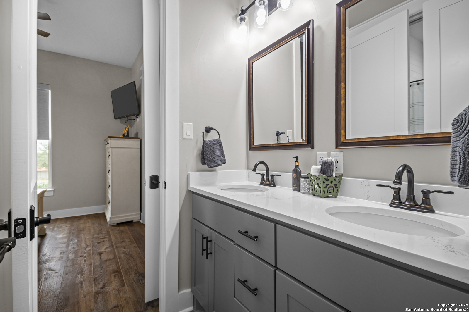 209 River Ridge Boerne, TX 78006 - Photo 29 of 60 a bathroom with a sink and a mirror