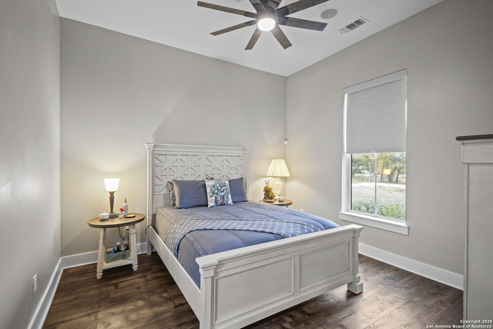 209 River Ridge Boerne, TX 78006 - Photo 31 of 60 a bedroom with a bed and window