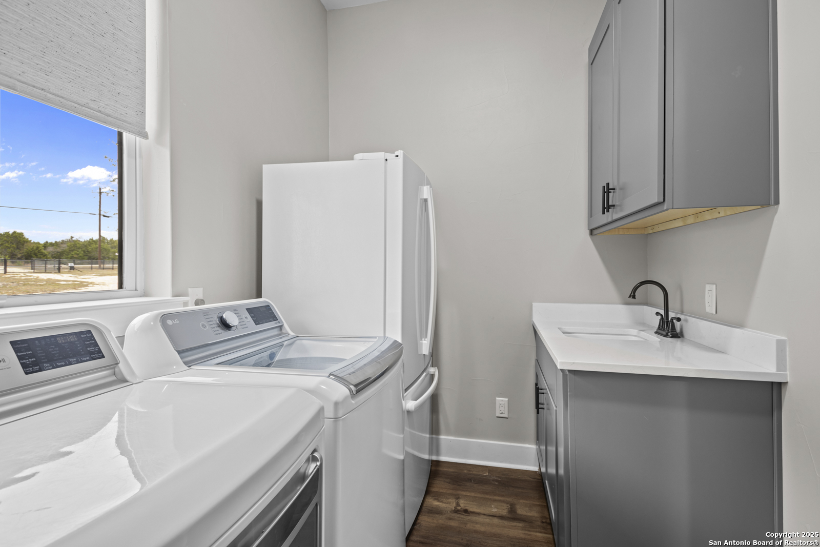 209 River Ridge Boerne, TX 78006 - Photo 32 of 60 a bathroom with a sink and a mirror