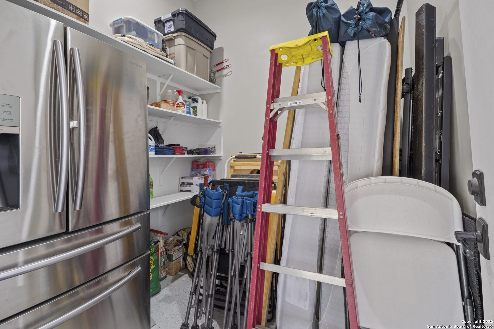 209 River Ridge Boerne, TX 78006 - Photo 36 of 60 a view of walk in closet with clothes and shoes