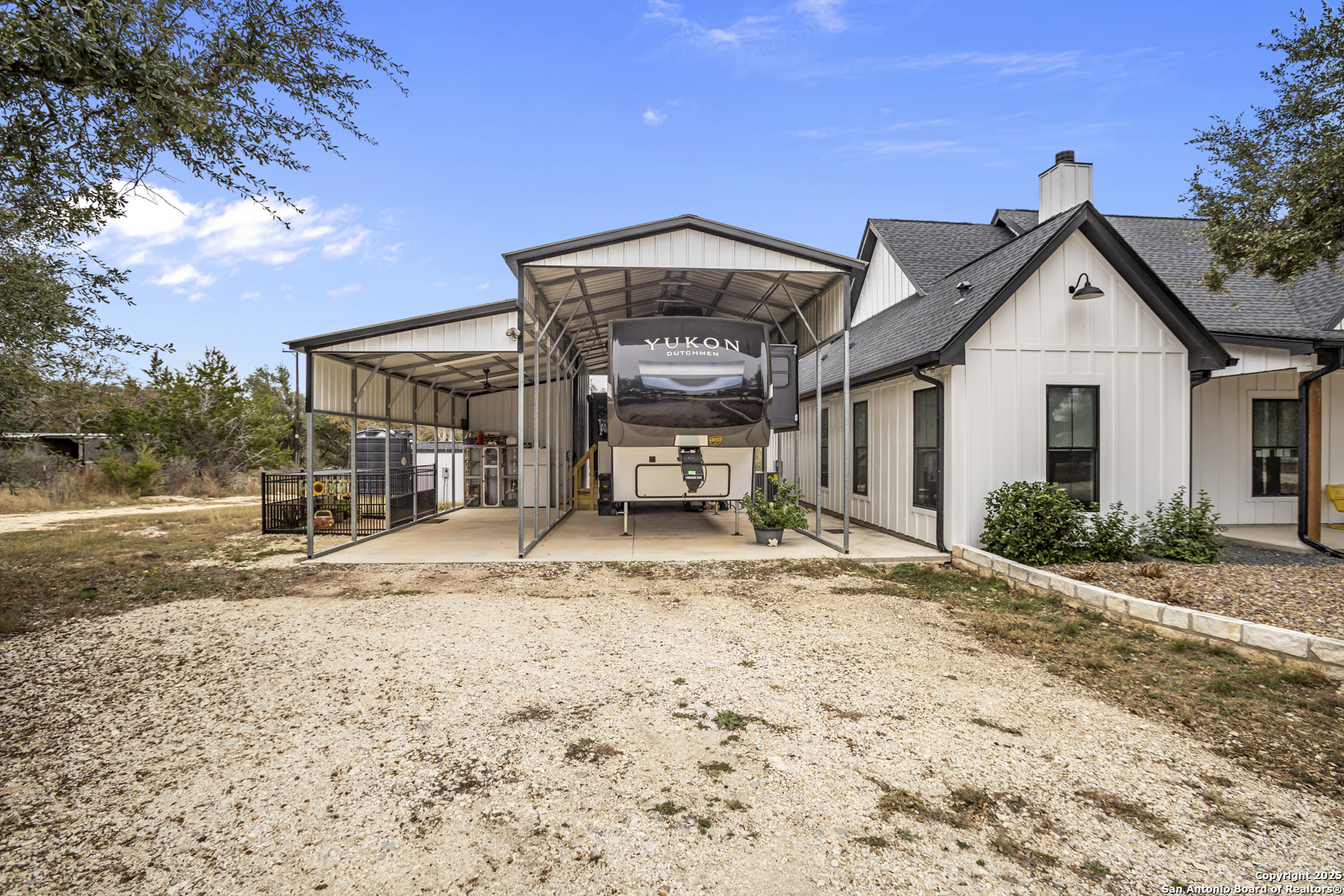 209 River Ridge Boerne, TX 78006 - Photo 40 of 60 a view of a house with a snow in the background