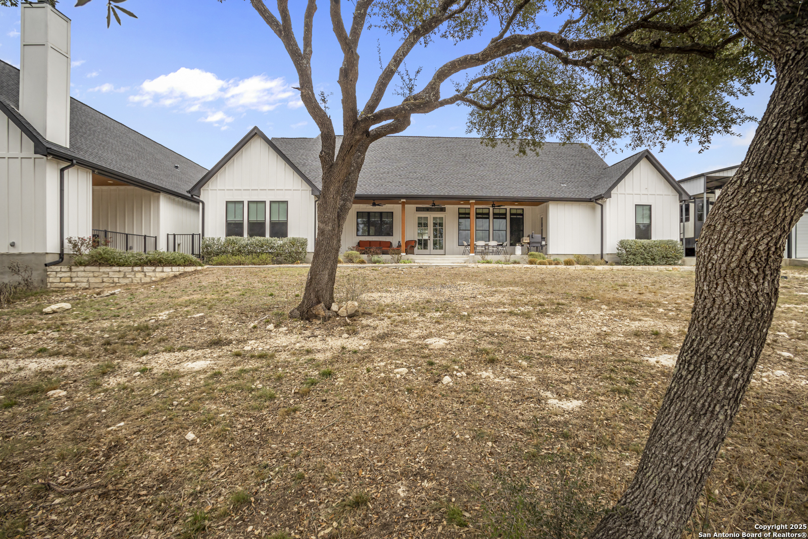 209 River Ridge Boerne, TX 78006 - Photo 42 of 60 a front view of a house with a yard