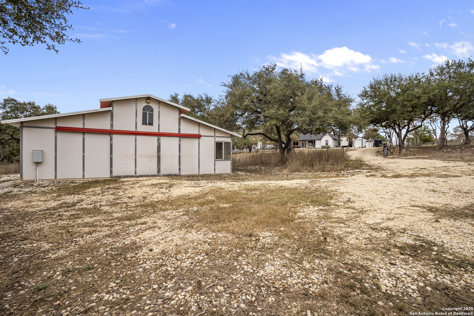 209 River Ridge Boerne, TX 78006 - Photo 46 of 60 a front view of a house with a yard