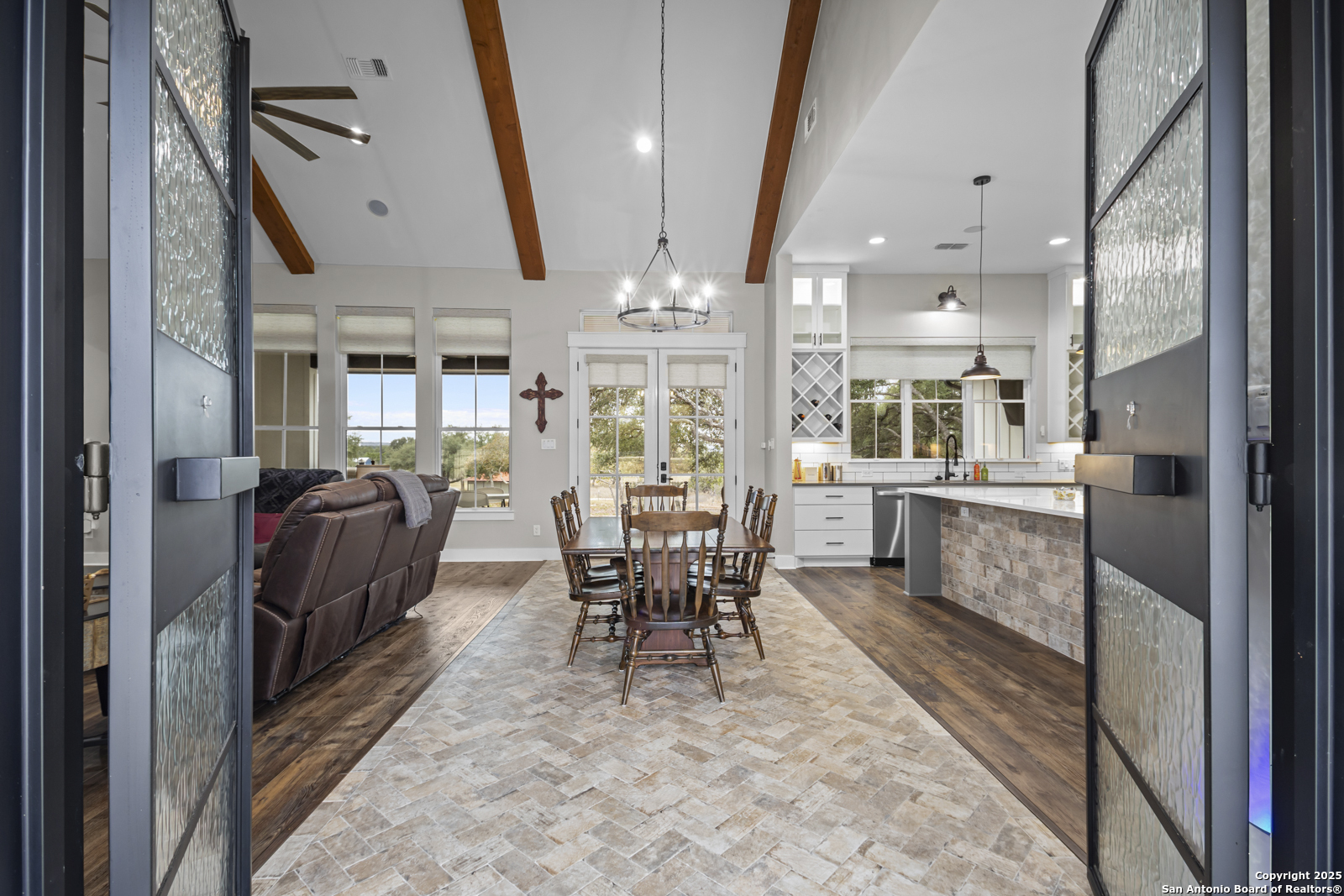 209 River Ridge Boerne, TX 78006 - Photo 5 of 60 a dining room with furniture and kitchen view