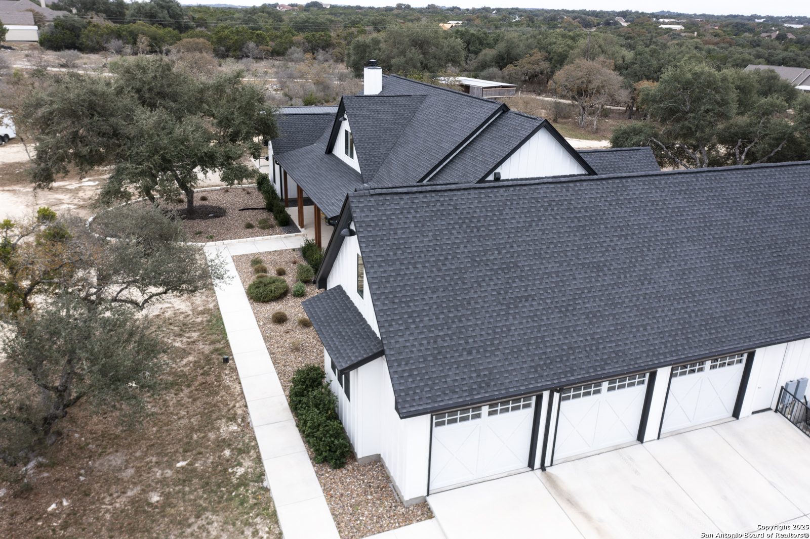 209 River Ridge Boerne, TX 78006 - Photo 60 of 60 a aerial view of a house with a yard balcony