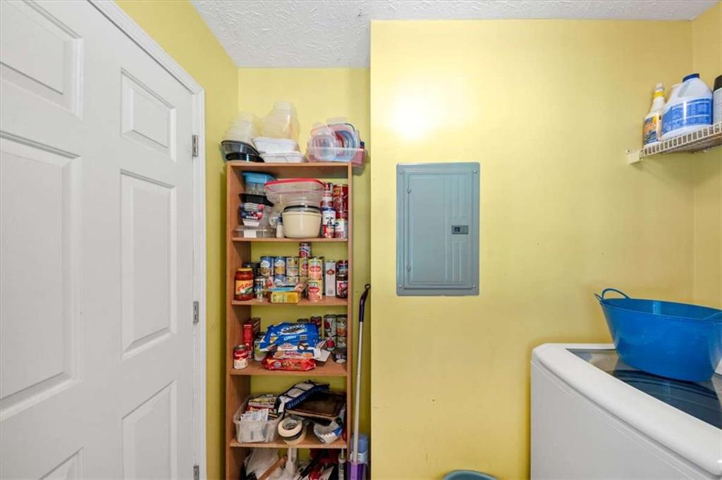 221 Pleasant Way Temple, GA 30179 - Photo 16 of 35 a view of a utility room with fridge and closet