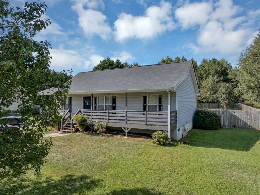 221 Pleasant Way Temple, GA 30179 - Photo 2 of 35 a front view of a house with a yard