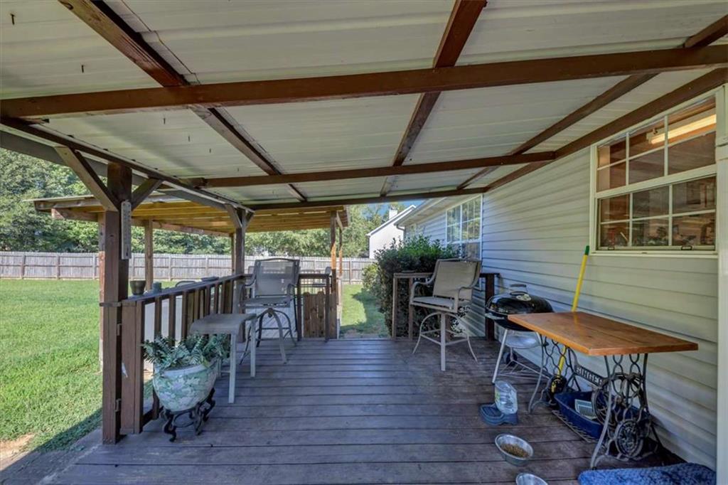221 Pleasant Way Temple, GA 30179 - Photo 27 of 35 a view of a chairs and table in the patio