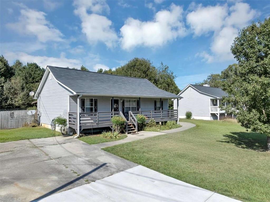 221 Pleasant Way Temple, GA 30179 - Photo 3 of 35 a view of a house with backyard and sitting area