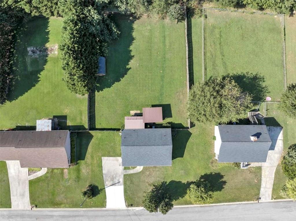 221 Pleasant Way Temple, GA 30179 - Photo 34 of 35 an aerial view of a house with a garden and lake view