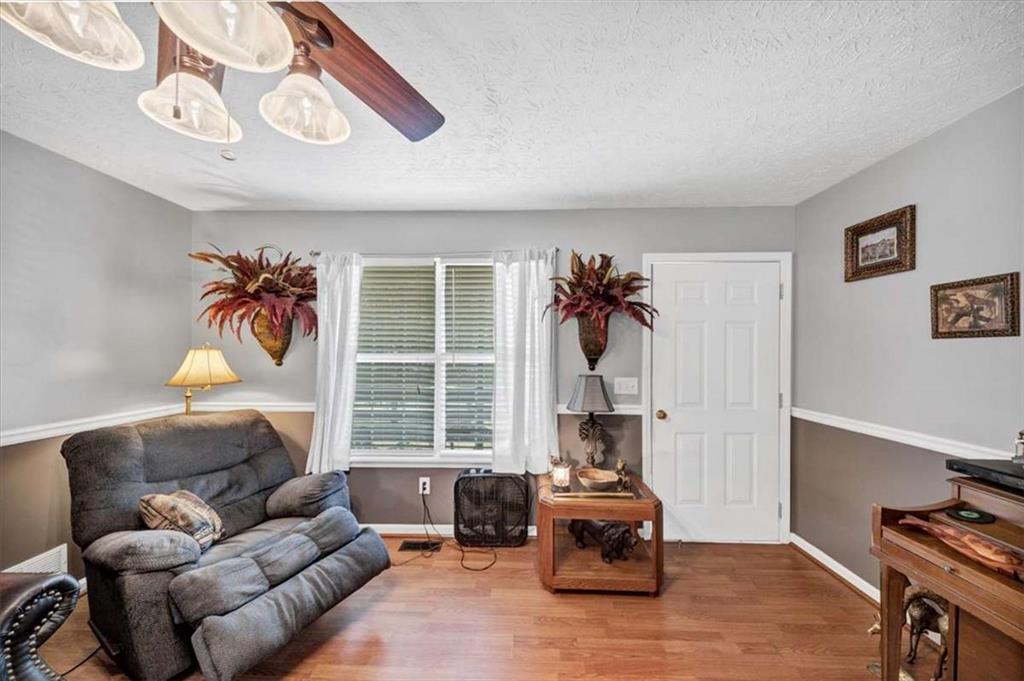 221 Pleasant Way Temple, GA 30179 - Photo 4 of 35 a living room with furniture and a large window