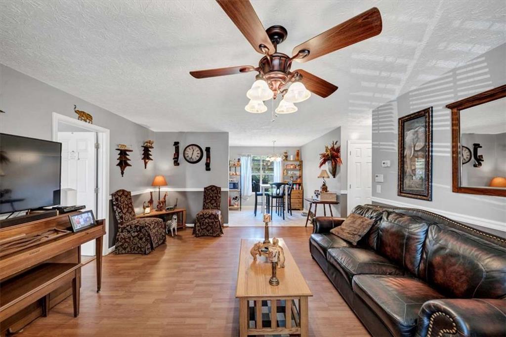 221 Pleasant Way Temple, GA 30179 - Photo 8 of 35 a living room with furniture and a flat screen tv