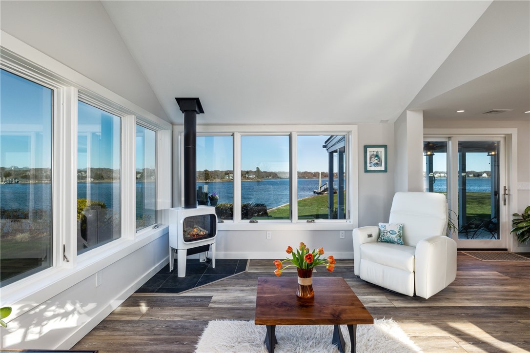 25 Barnacle Road Narragansett, RI 02882 - Photo 9 of 32 Jotul Norwegian gas stove keeps you warm while you are mesmerized by sweeping views
