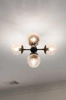 a bathroom with a sink and mirror