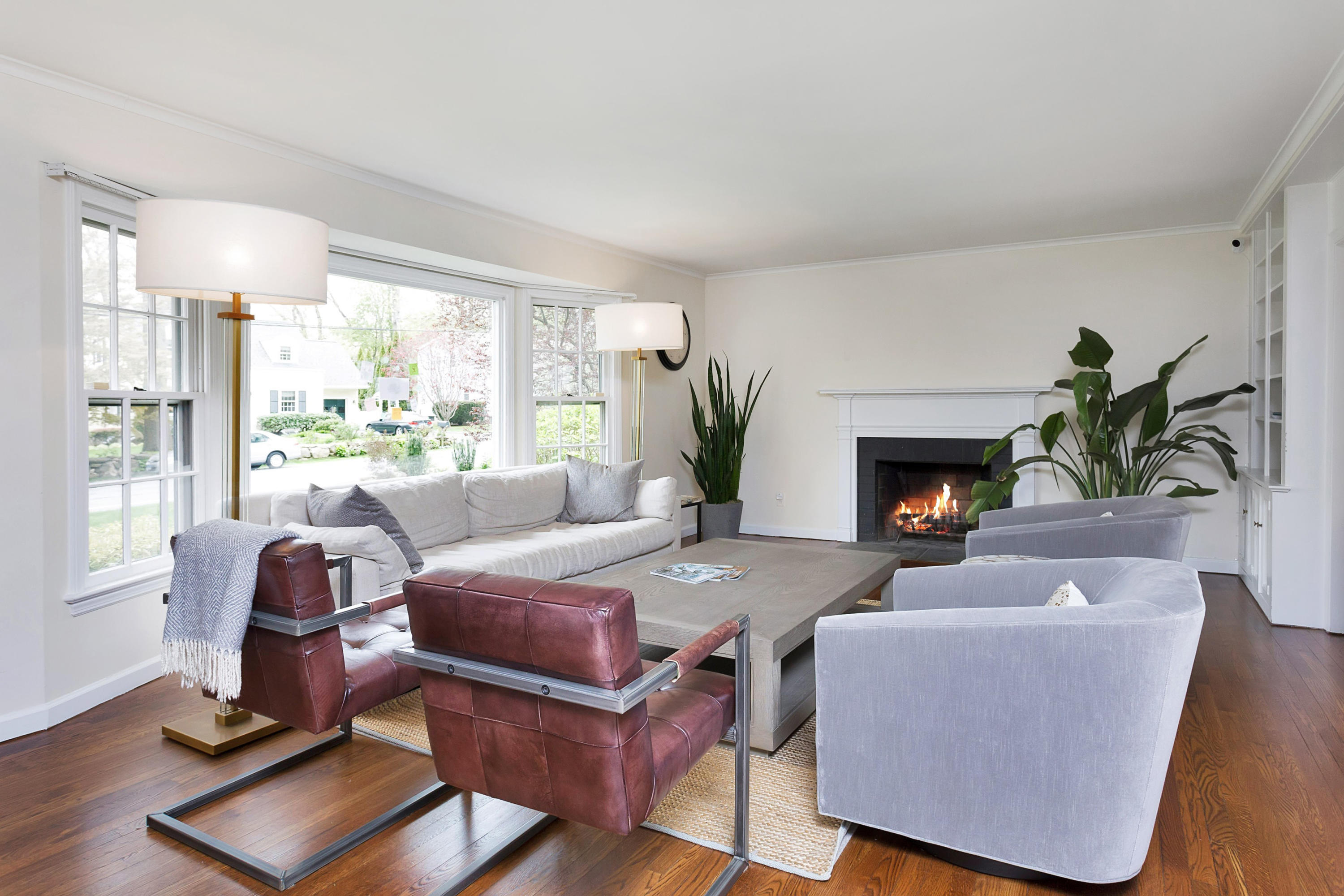 25 Bramble Lane Riverside, CT 06878 - Photo 2 of 10 a living room with furniture and a fireplace