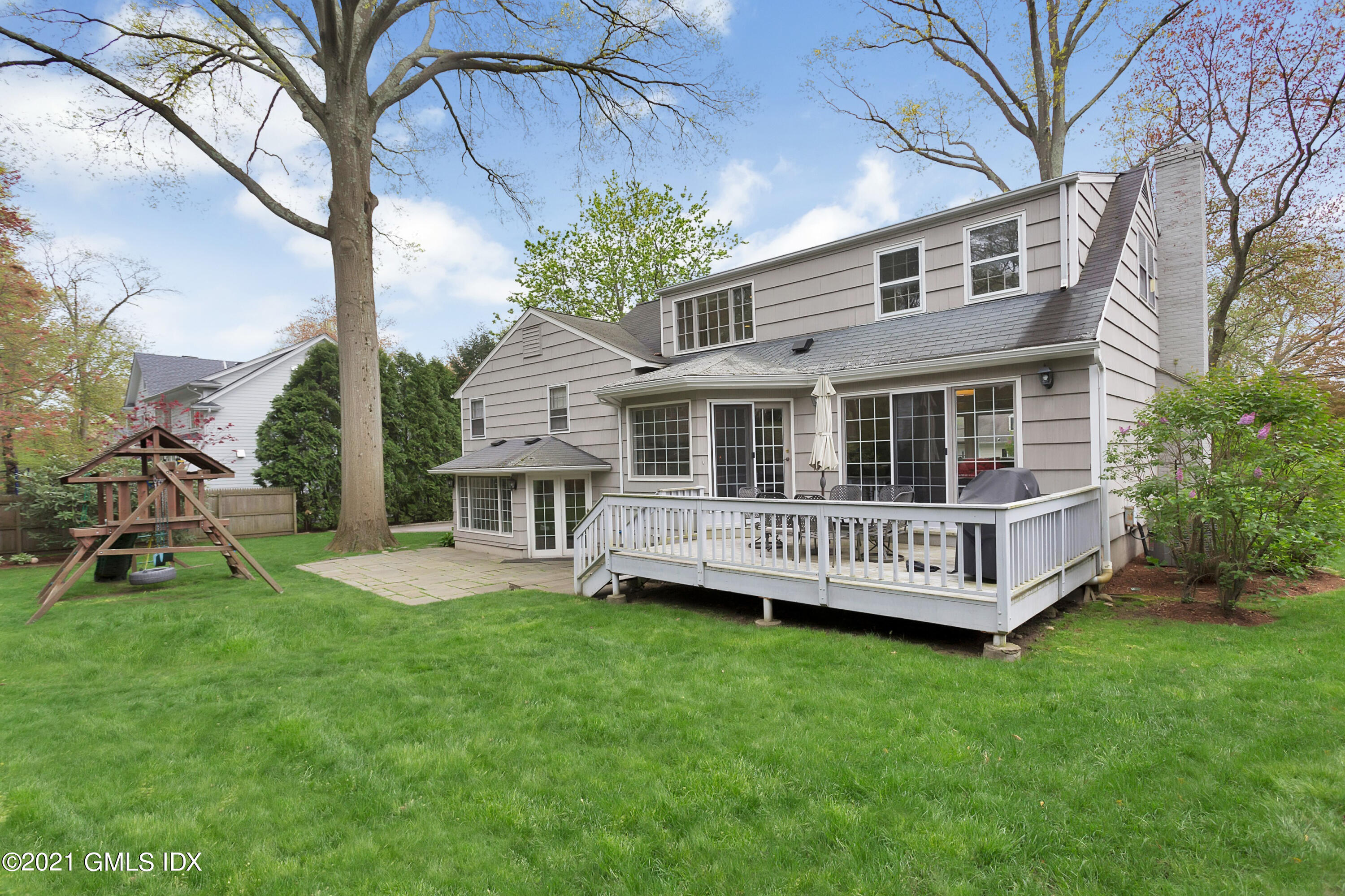 25 Bramble Lane Riverside, CT 06878 - Photo 10 of 10 a view of a house with a yard and sitting area