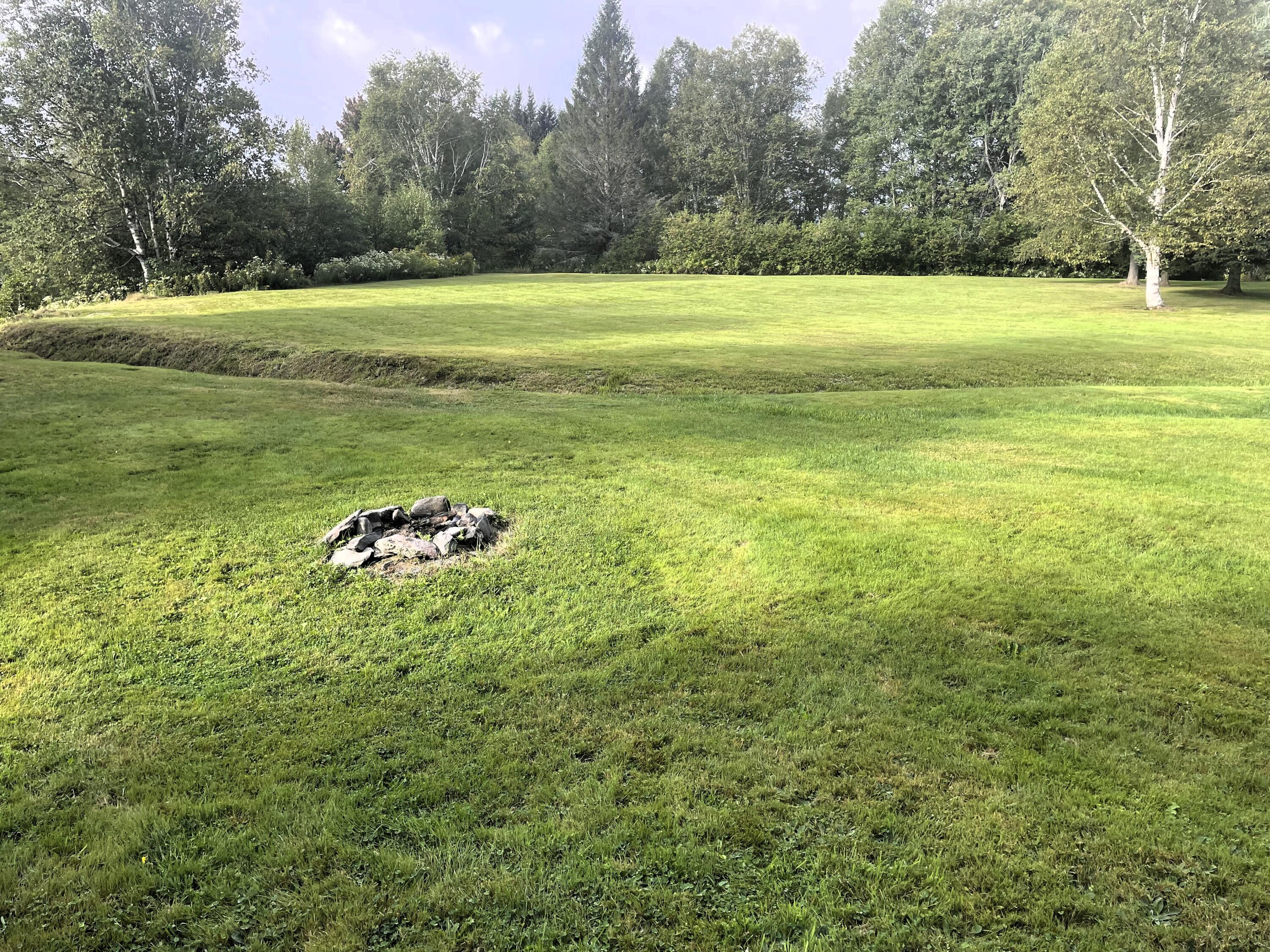 5 Heald Stream Road Jackman, ME 04945 - Photo 6 of 33 Back yard fire pit