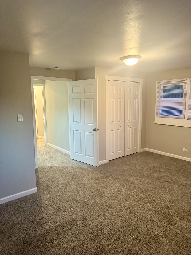 245 Allegheny Street Park Forest, IL 60466 - Photo 11 of 19 an empty room with windows