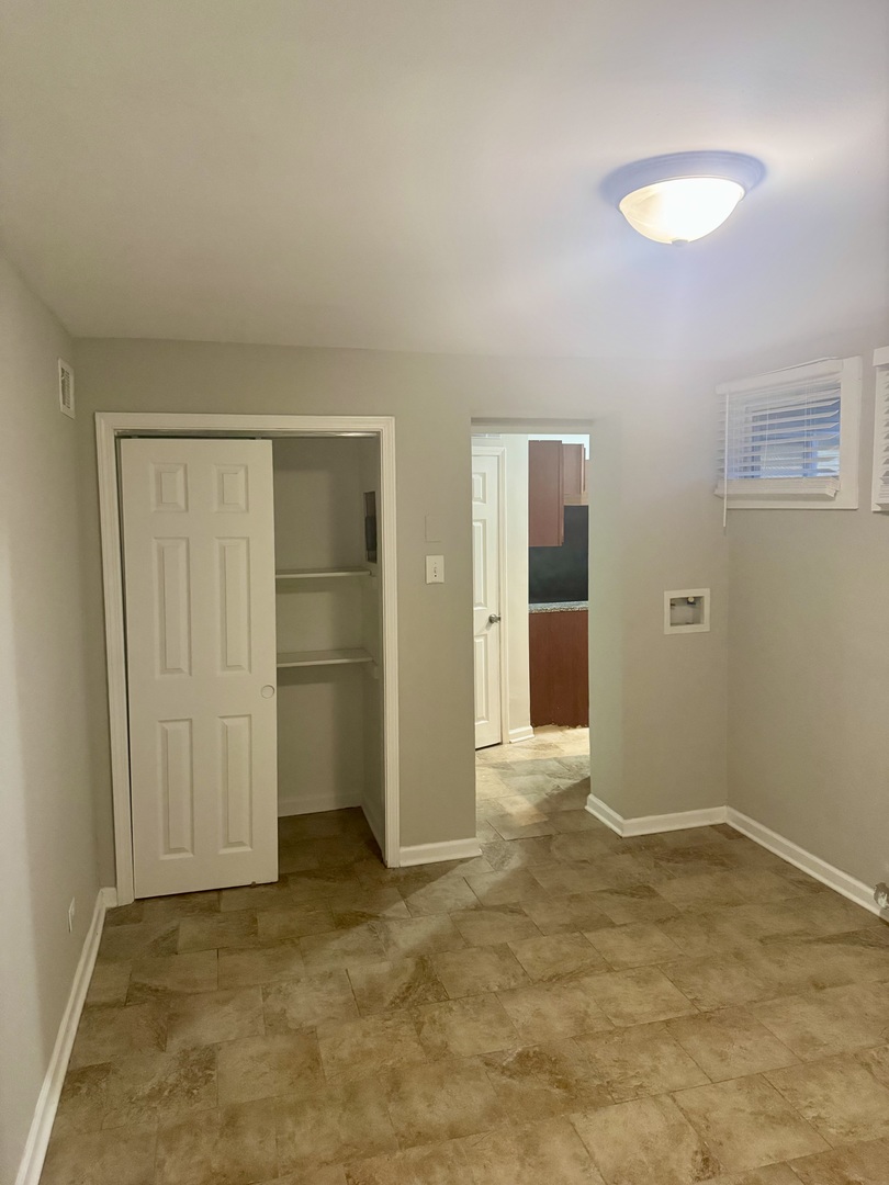 245 Allegheny Street Park Forest, IL 60466 - Photo 16 of 19 an empty room with closet and bathroom