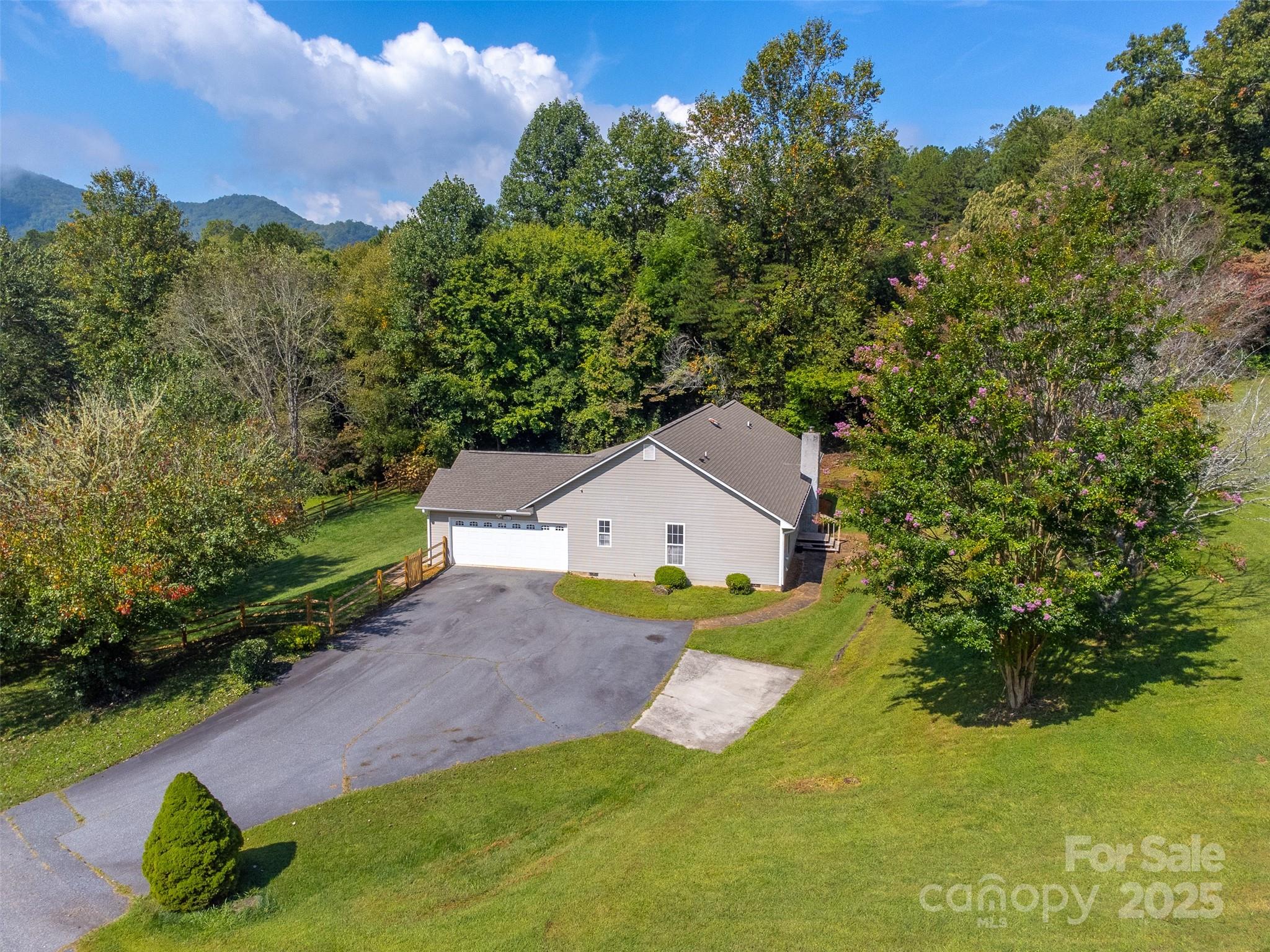 1061 Calvary Church Road Sylva, NC 28779 - Photo 40 of 46 an aerial view of a house