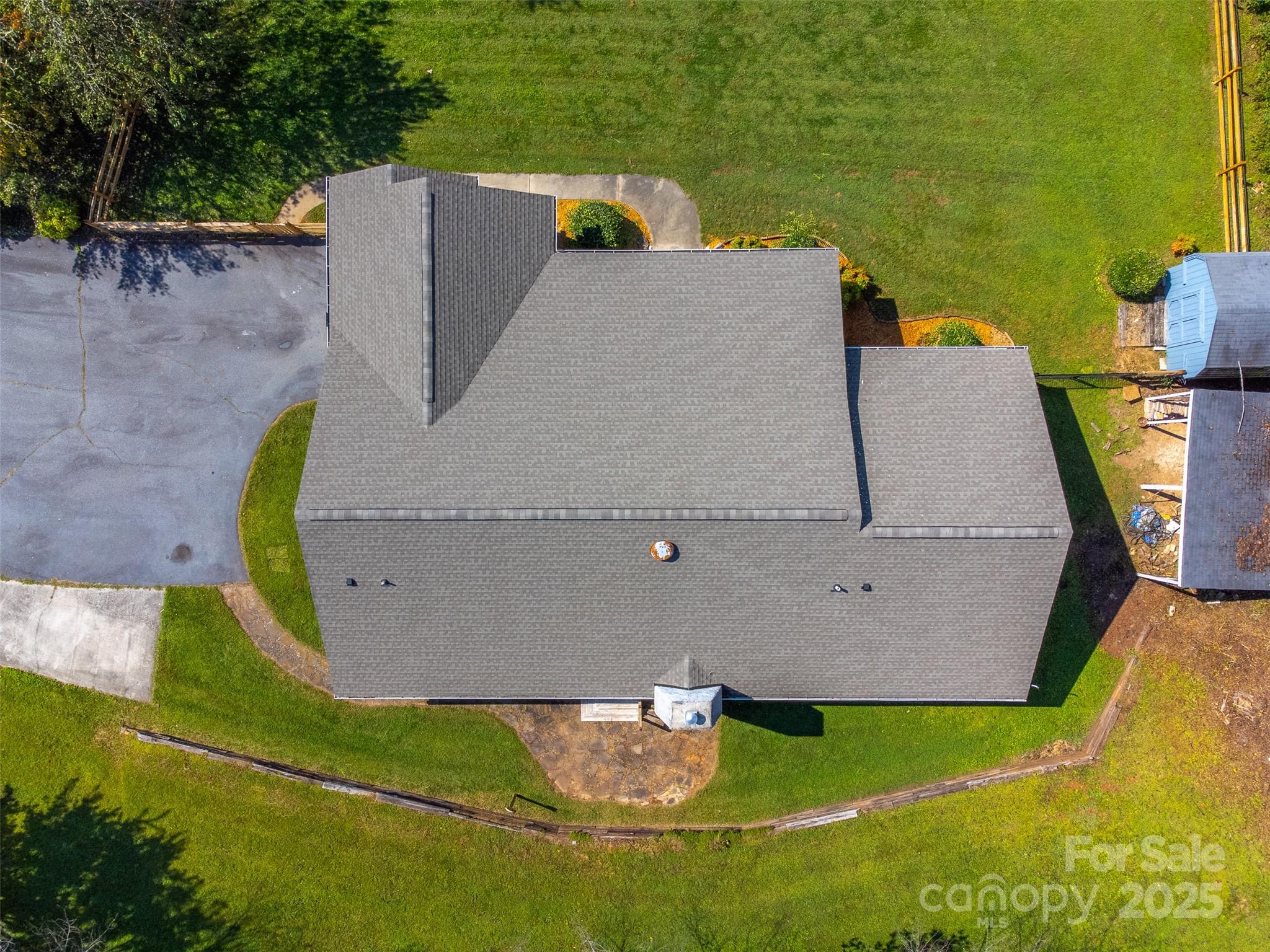 1061 Calvary Church Road Sylva, NC 28779 - Photo 44 of 46 an aerial view of a house with a swimming pool