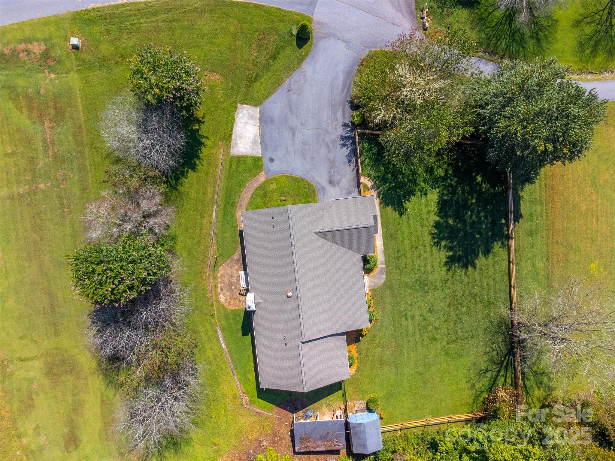 1061 Calvary Church Road Sylva, NC 28779 - Photo 45 of 46 an aerial view of a residential houses with outdoor space and swimming pool
