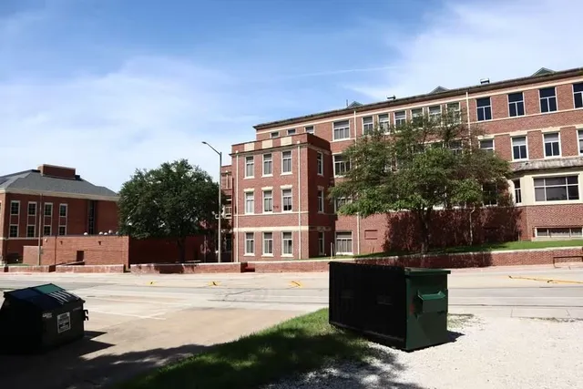 a view of building with yard