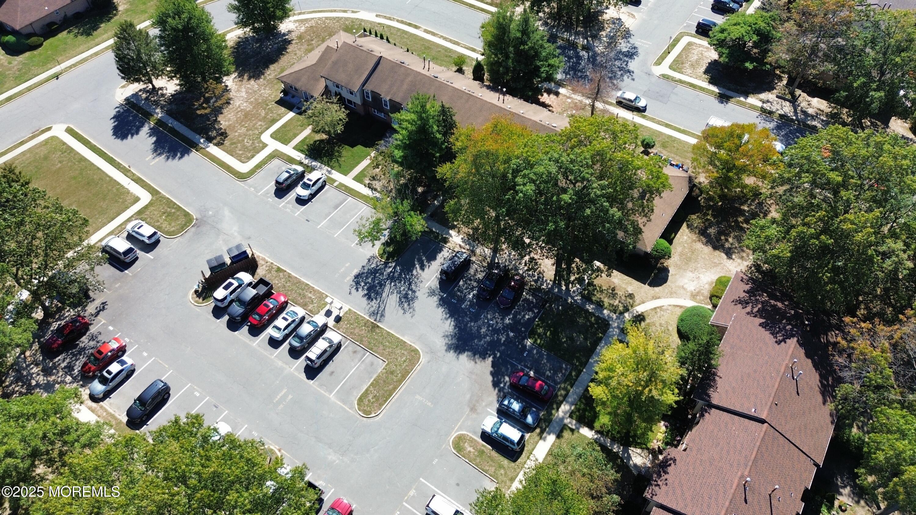 550 Labanna Court Brick, NJ 08724 - Photo 34 of 38 an aerial view of a house with a lot of trees all around