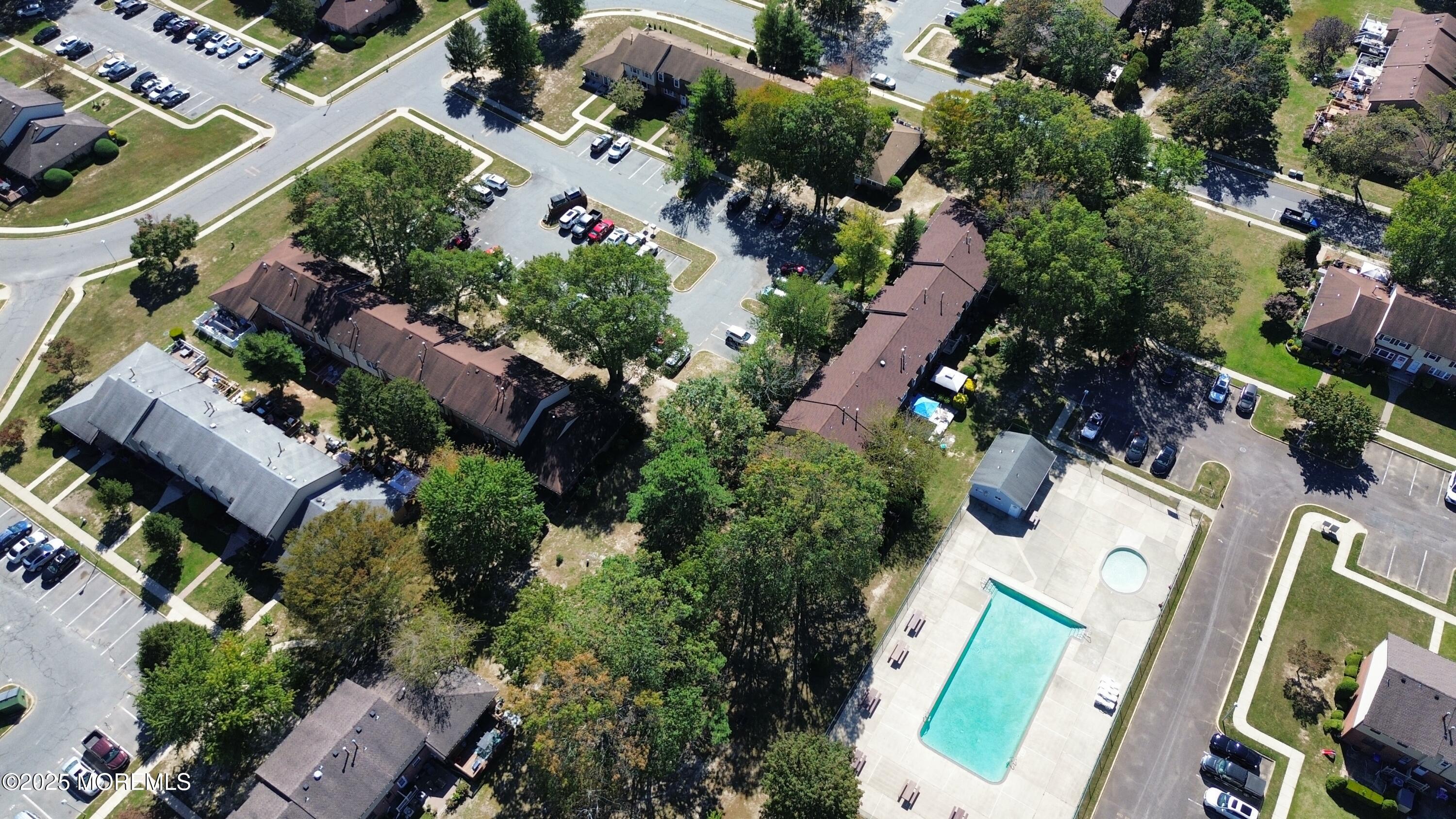 550 Labanna Court Brick, NJ 08724 - Photo 37 of 38 an aerial view of a house with a yard and outdoor seating