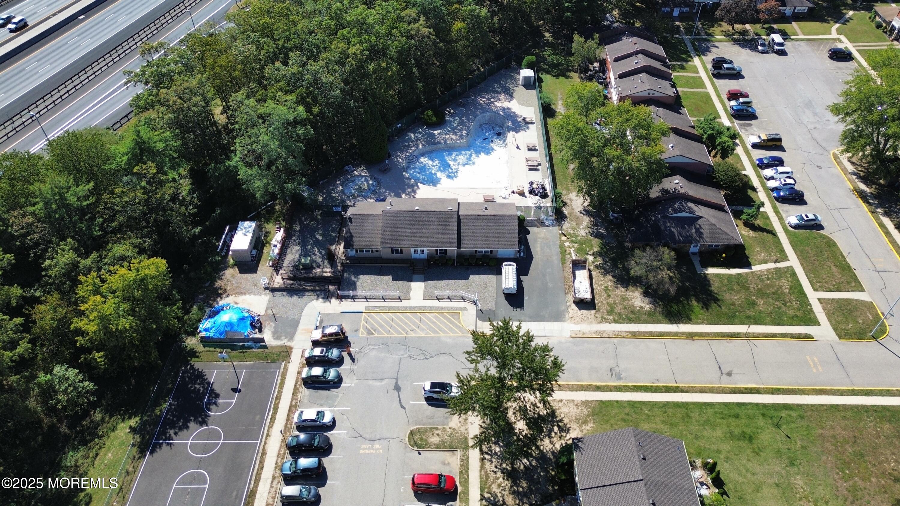 550 Labanna Court Brick, NJ 08724 - Photo 38 of 38 an aerial view of a house with garden space and sitting area