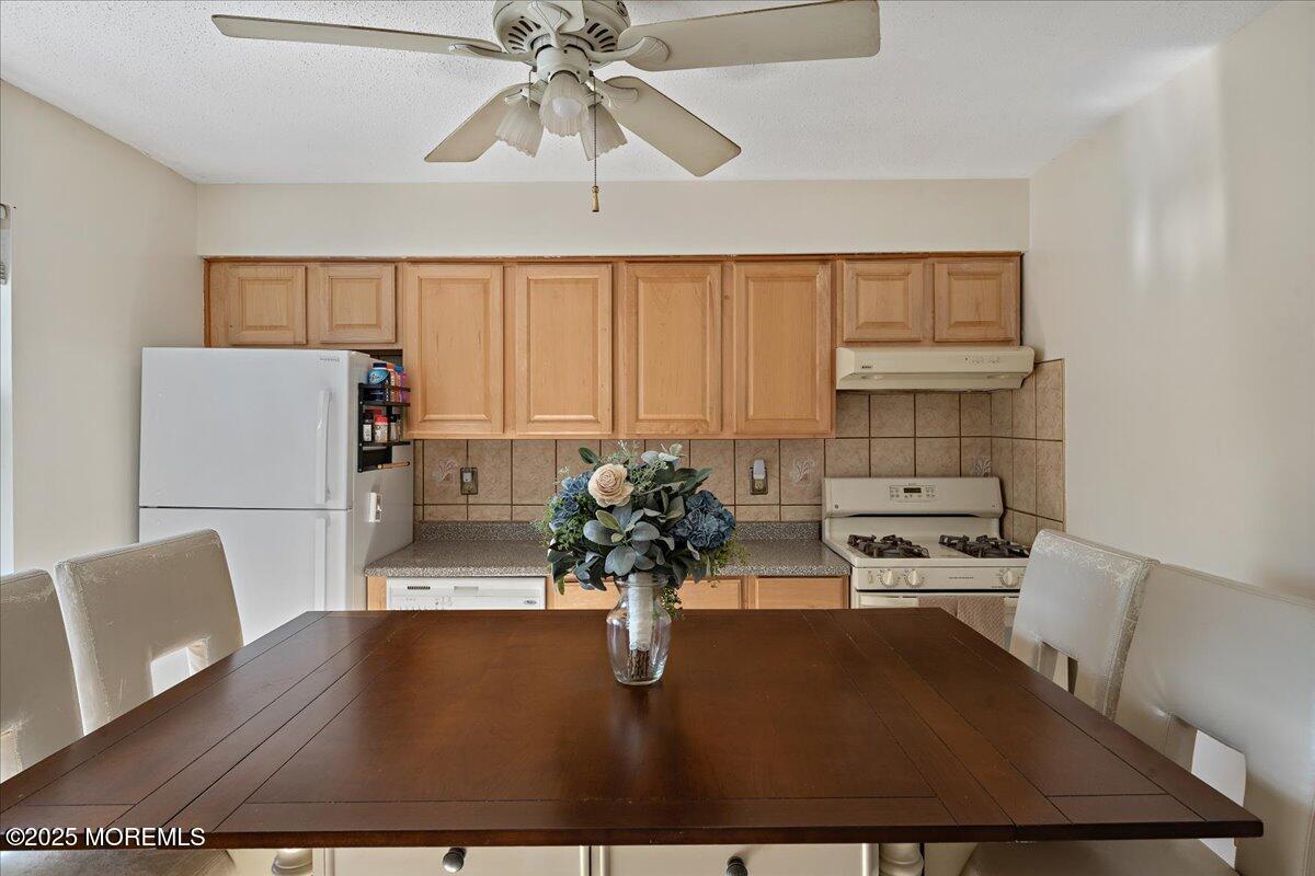 550 Labanna Court Brick, NJ 08724 - Photo 10 of 38 a view of kitchen with furniture and wooden floor