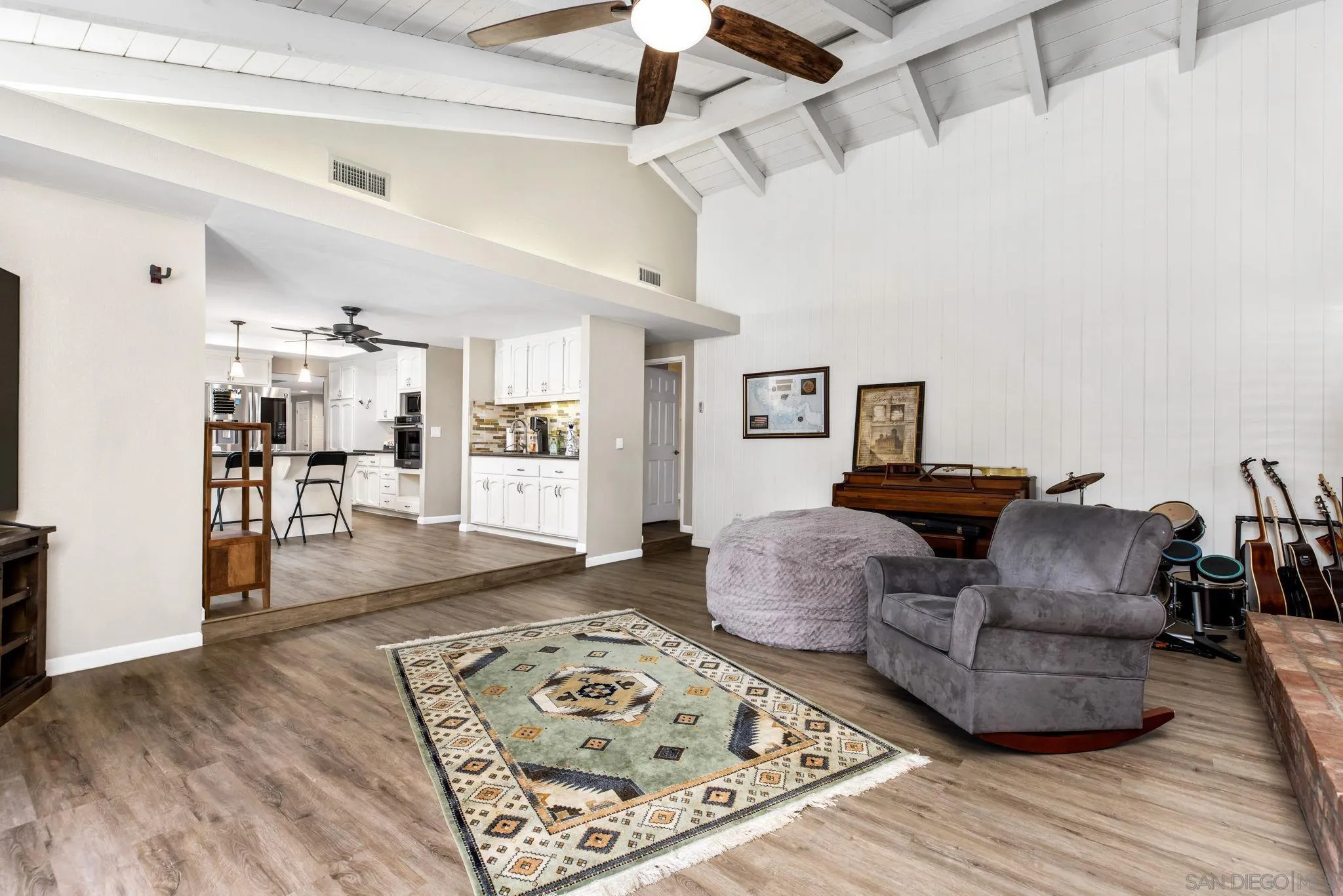 16614 Wikiup Road Ramona, CA 92065 - Photo 11 of 37 a living room with furniture and a wooden floor