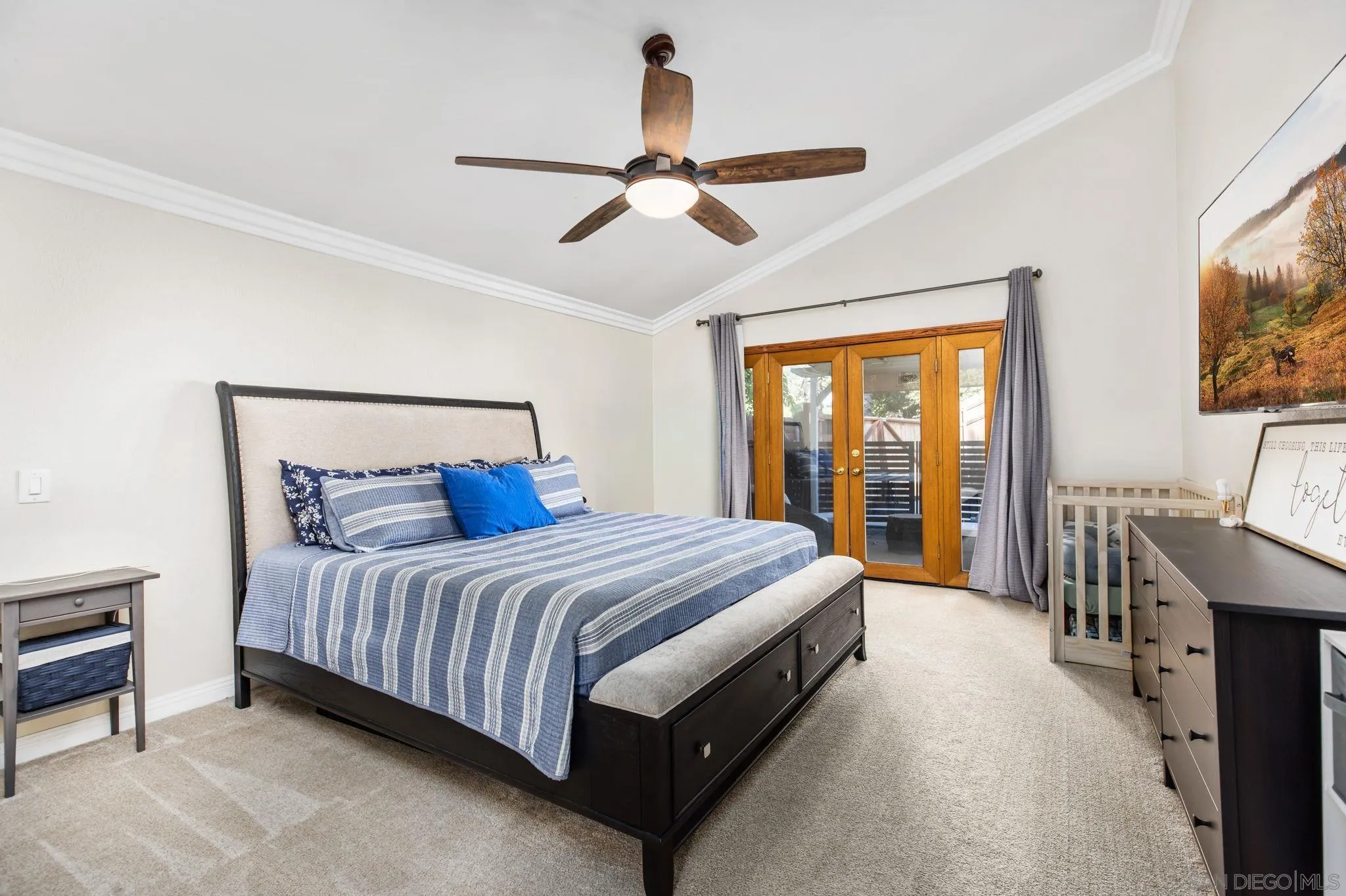 16614 Wikiup Road Ramona, CA 92065 - Photo 17 of 37 a bed room with a bed and a flat tv screen