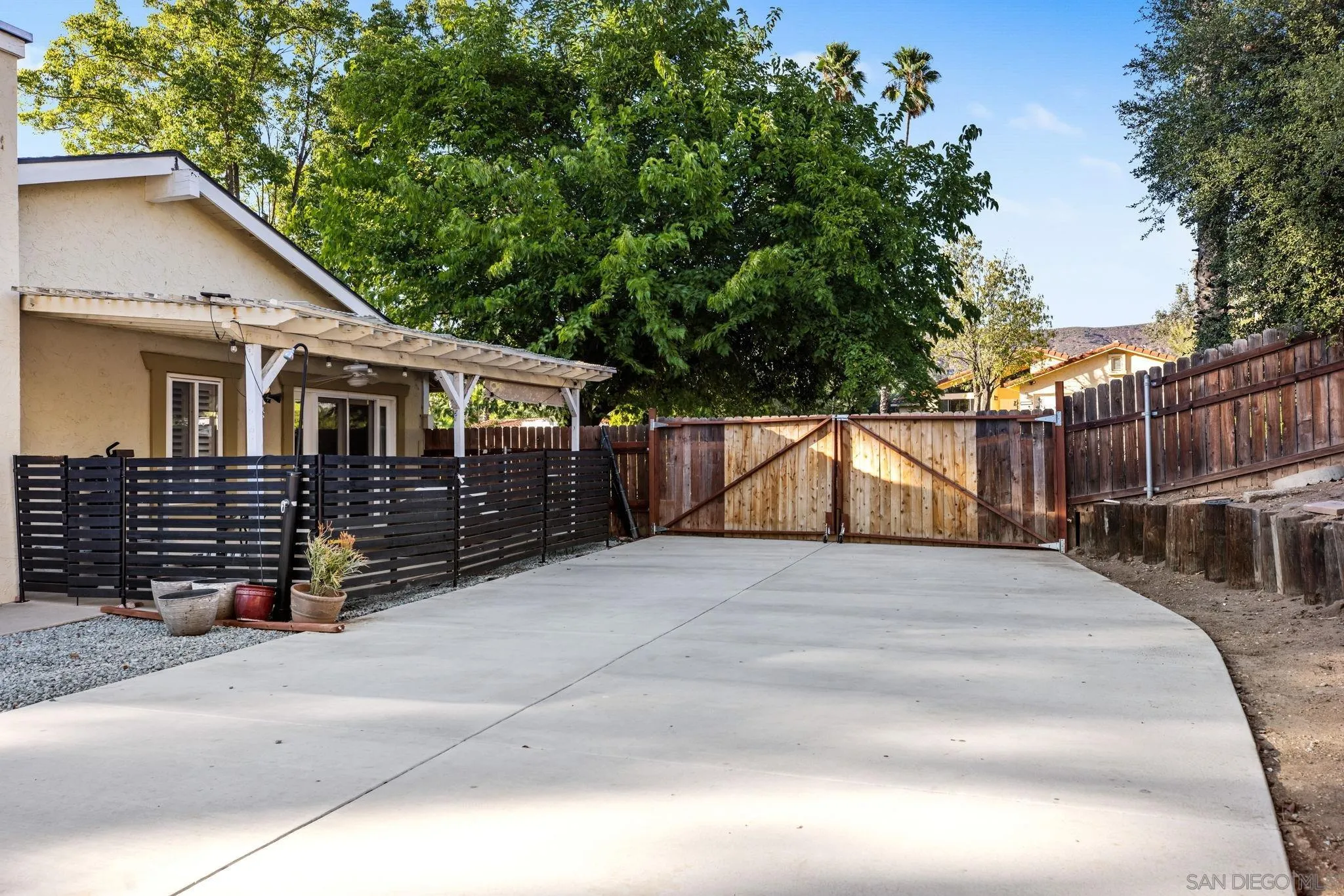 16614 Wikiup Road Ramona, CA 92065 - Photo 33 of 37 a front view of a house with a tree