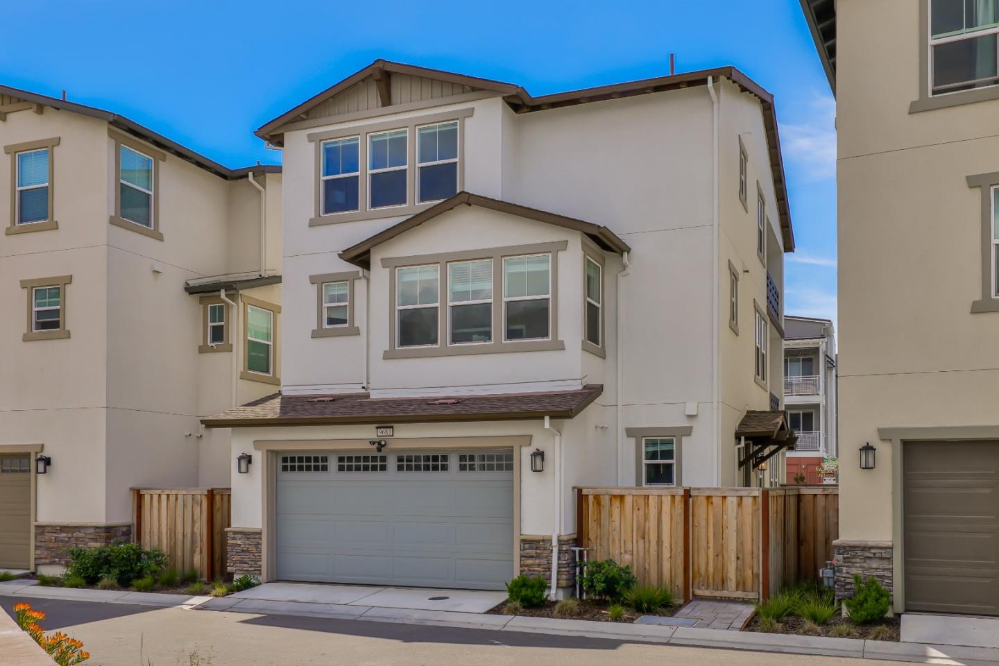 9683 Seawind Way Newark, CA 94560 - Photo 2 of 13 a front view of a house with a yard