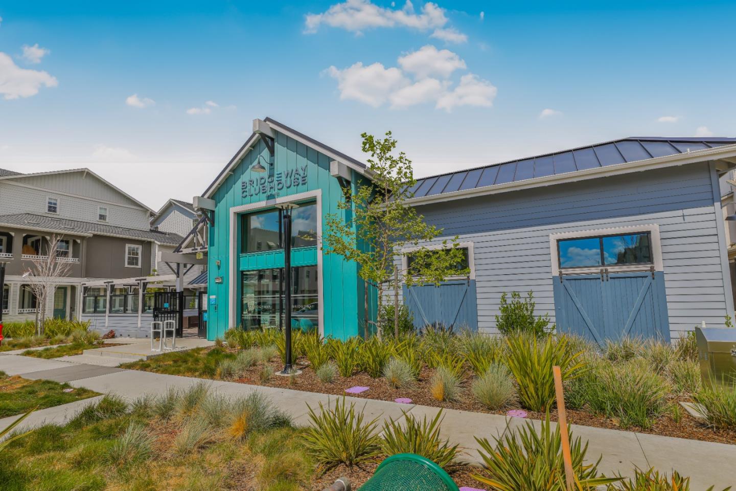 9683 Seawind Way Newark, CA 94560 - Photo 3 of 13 a front view of a house with garden