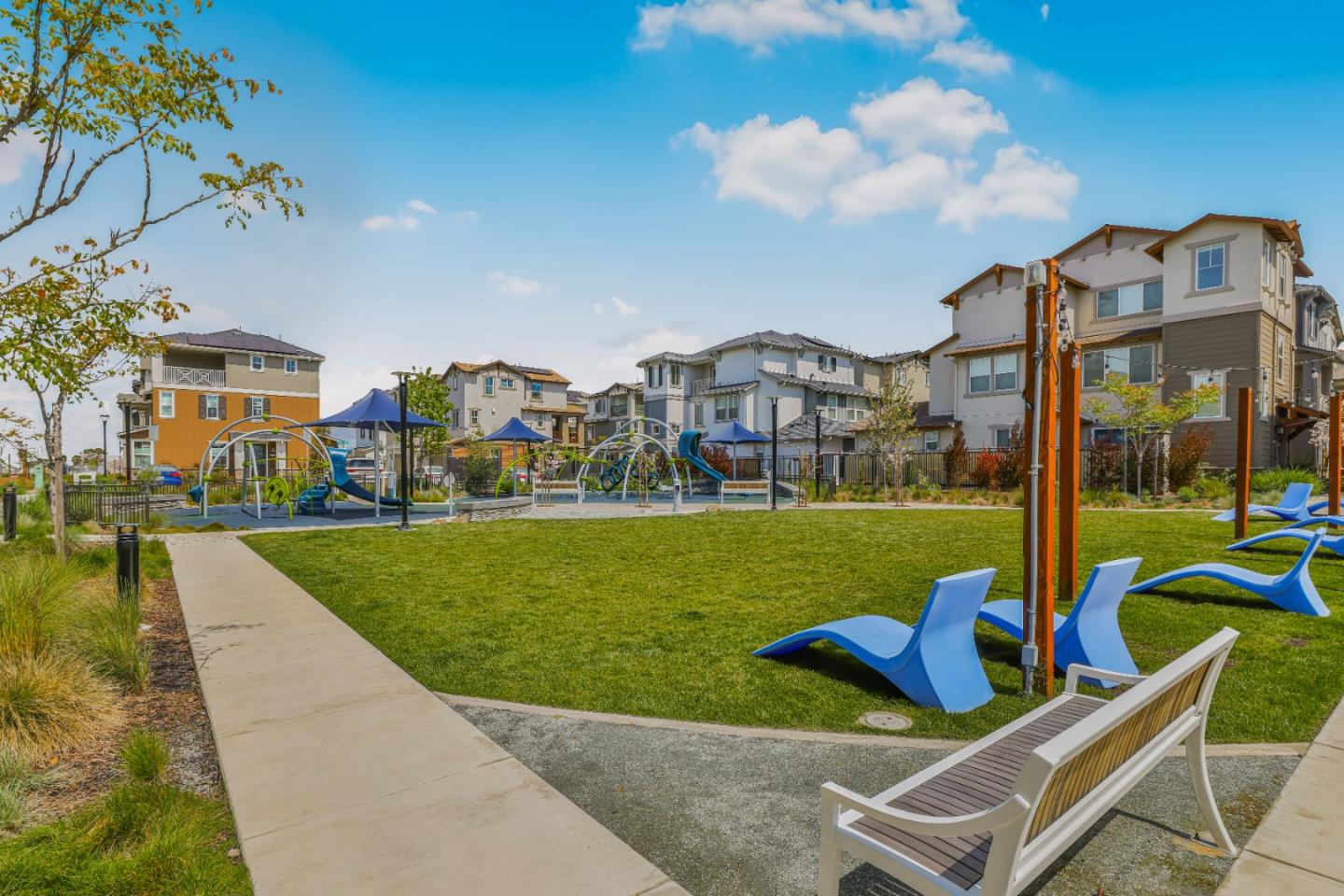 9683 Seawind Way Newark, CA 94560 - Photo 4 of 13 a view of a house with a big yard and potted plants