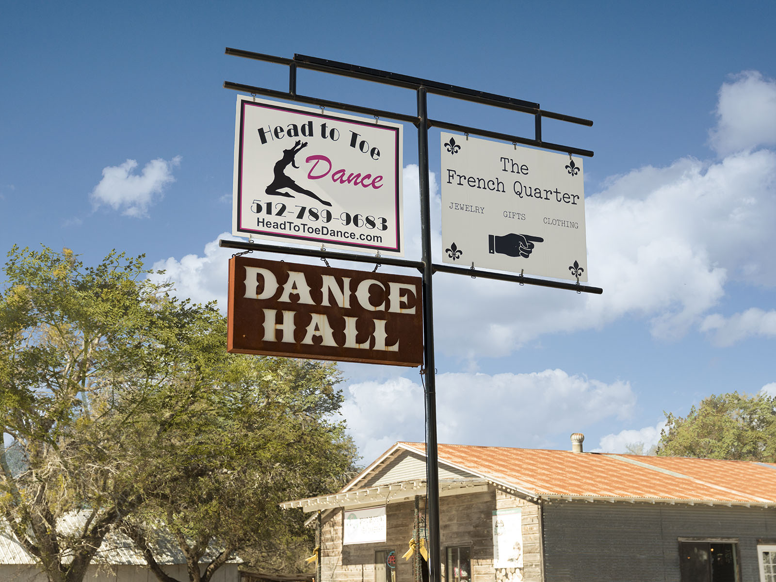 478 El Capitan Loop Dripping Springs, TX 78620 - Photo 11 of 14 a sign on a pole on a street