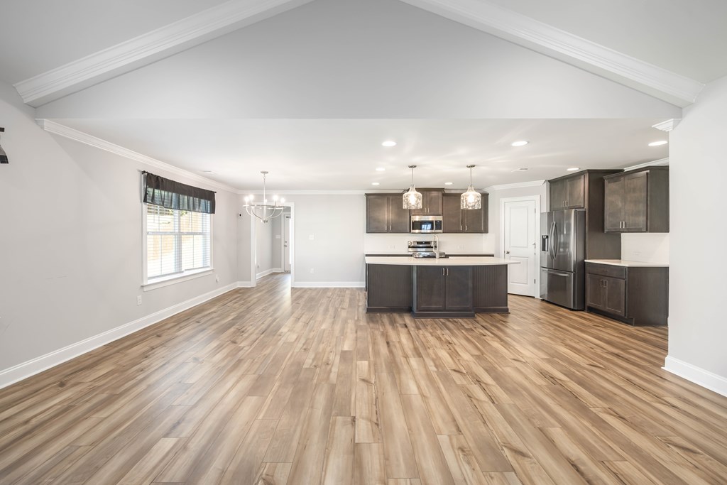 50 Ivy Loop Phenix City, AL 36867 - Photo 7 of 23 a view of kitchen with wooden floor and electronic appliances