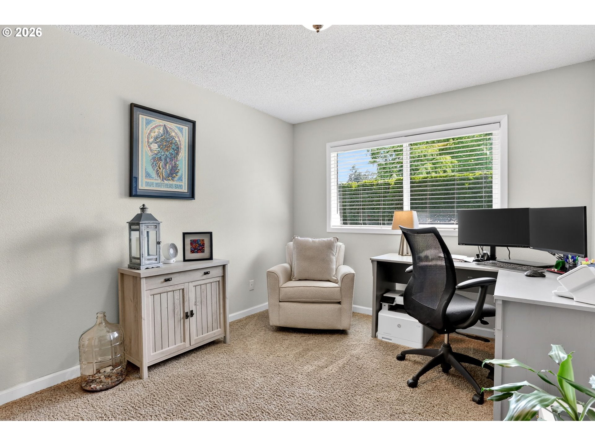 1776 Southeast 114th Place Portland, OR 97216 - Photo 40 of 47 a livingroom with workspace and a window