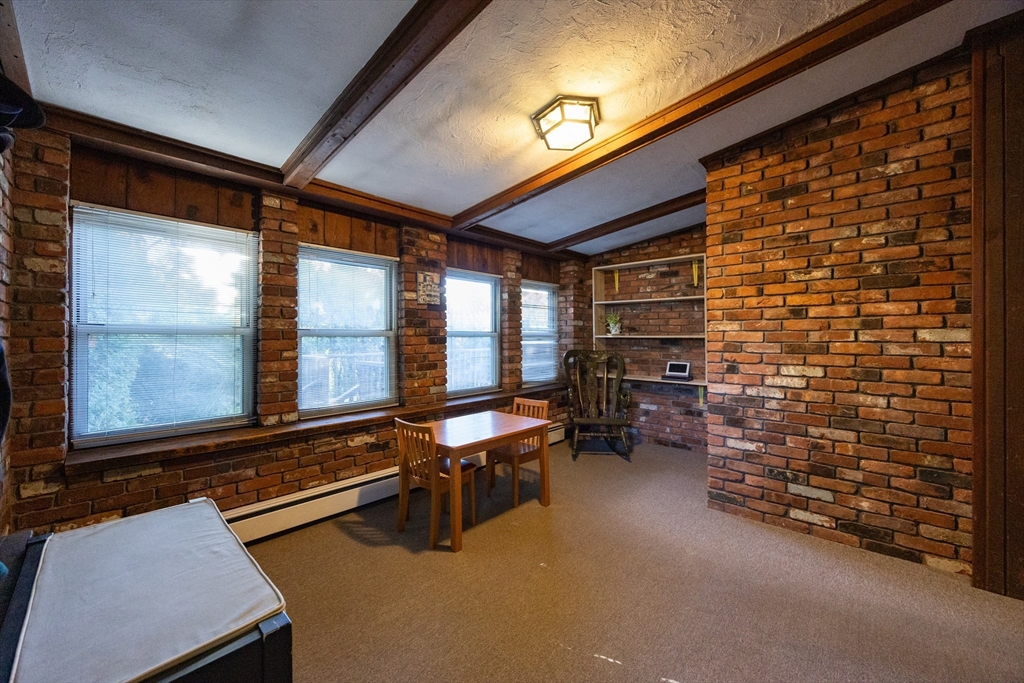 41 Roy Street Swampscott, MA 01907 - Photo 11 of 42 a room with furniture and a large window