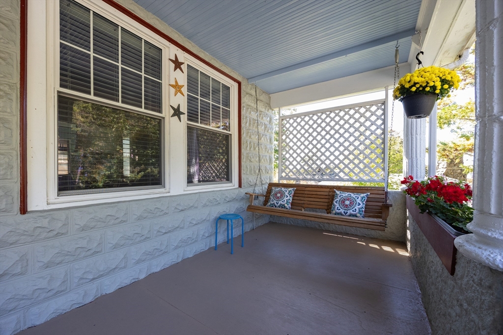 41 Roy Street Swampscott, MA 01907 - Photo 34 of 42 a outdoor living space with furniture and flowers