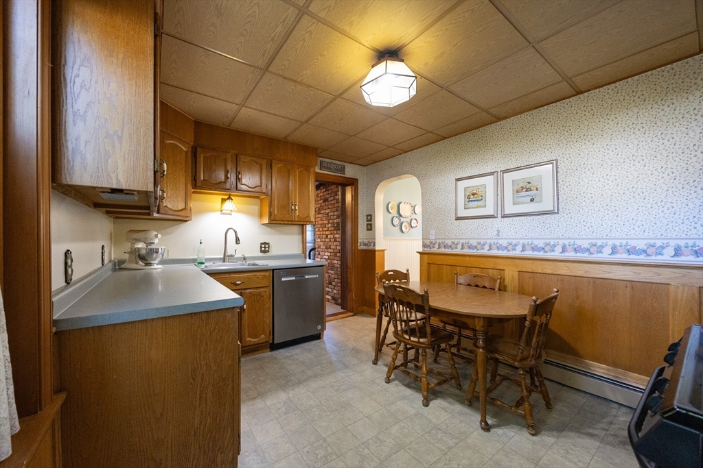 41 Roy Street Swampscott, MA 01907 - Photo 7 of 42 a kitchen with a sink cabinets and window
