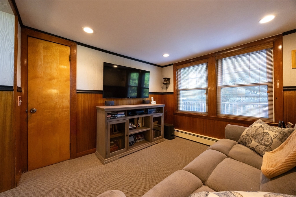 41 Roy Street Swampscott, MA 01907 - Photo 10 of 42 a livingroom with furniture and a flat screen tv