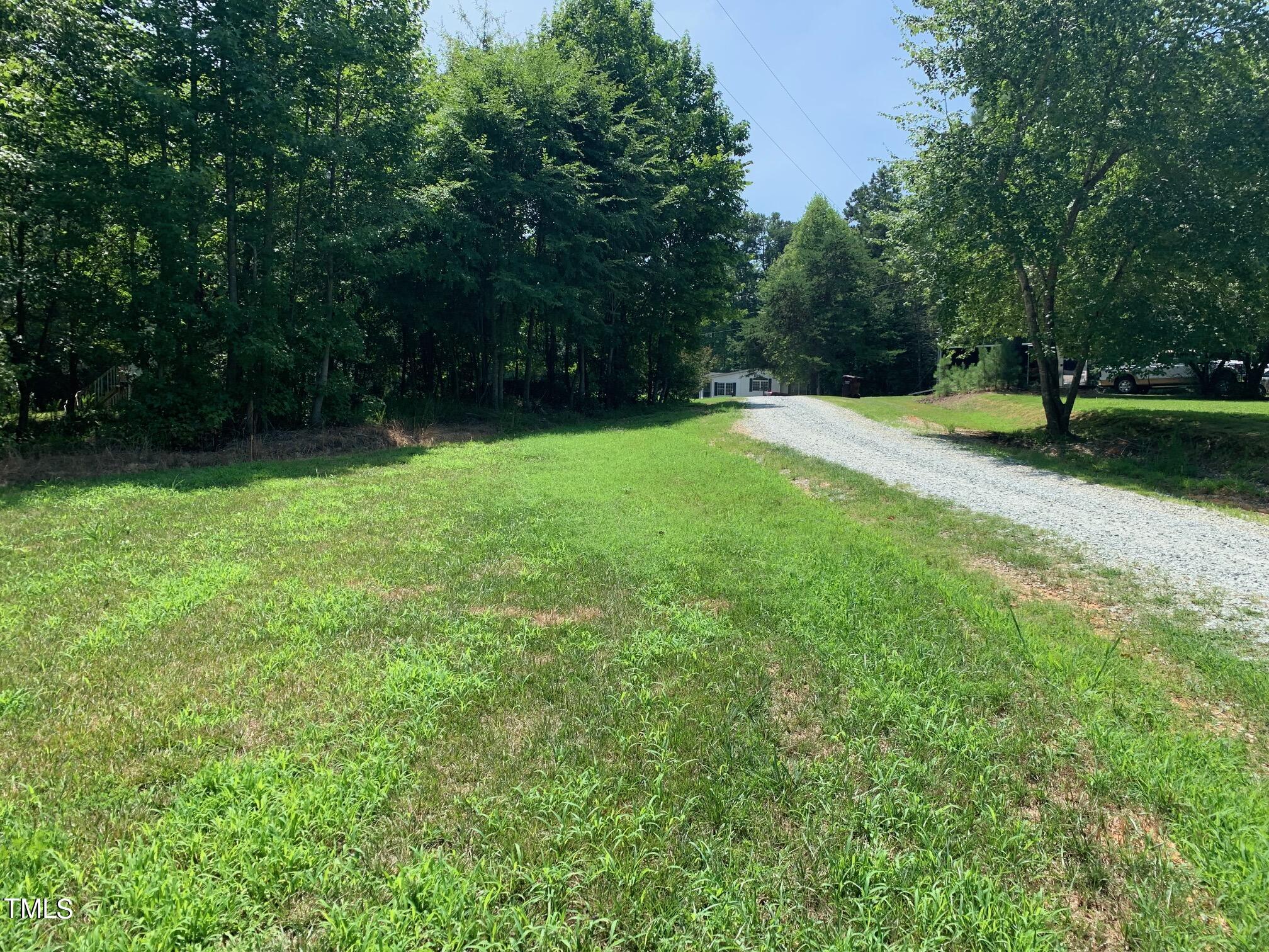 150 Smith Hill Lane Roxboro, NC 27574 - Photo 3 of 6 a view of backyard with green space