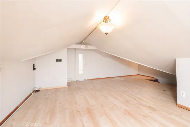 a view of a room with white walls