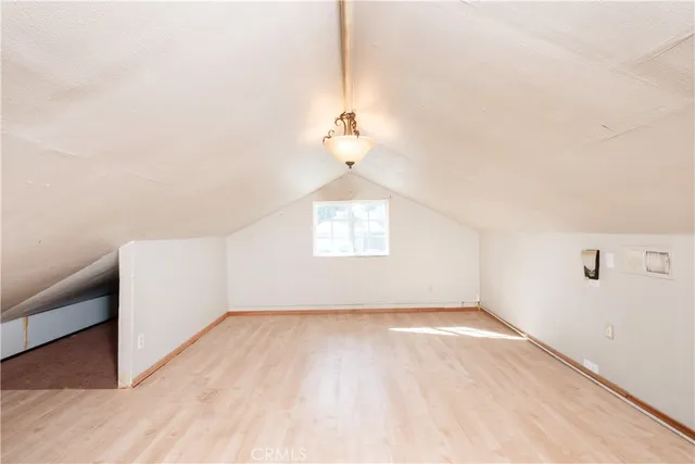 a view of a room with white walls