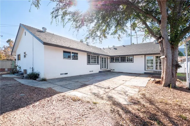 a house view with a outdoor space