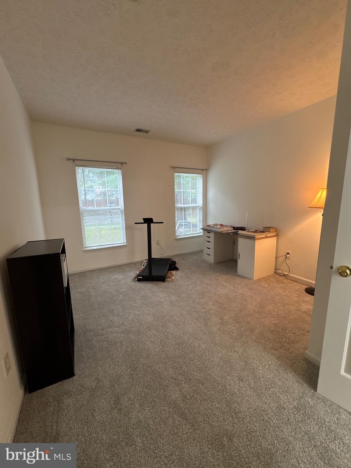 5144 Brightleaf Court, Unit 5144 Rosedale, MD 21237 - Photo 26 of 47 a living room with furniture and a window